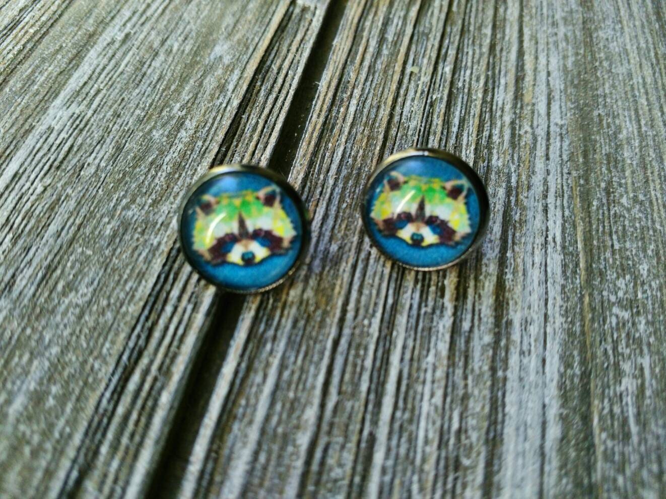 RASCALLY RACCOONS: 12mm Geometric raccoon glass cabochon post stud earrings in gunmetal settings.