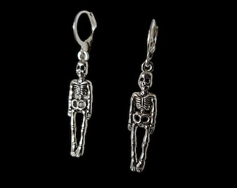 Bones-skeleton hugging earrings.