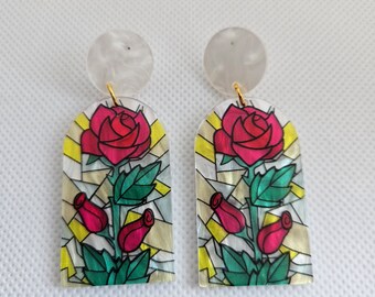 Once upon a time-laser cut acrylic rose colored glass dangle stud post earrings.