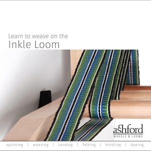 May include: An Ashford Inkle Loom made of light-colored wood with a woven band featuring green, blue, black, and white stripes wrapped around the frame. The text "Learn to weave on the Inkle Loom" and "ashford WHEELS & LOOMS" is visible.