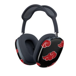 May include: Dark gray over-ear headphones with a black ear cup design featuring red cloud graphics. The headband is dark gray with a mesh top. The ear cups are oval-shaped.