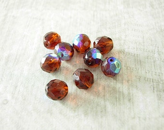 Topaz AB, Brown Czech glass beads, round faceted with metallic AB coating on one side. 12 vintage 10 mm beads.
