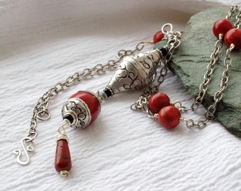 Long red and silver pendant necklace set with vintage Tibetan beads, boho chic.