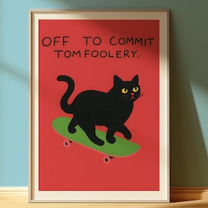 May include: Framed art print with a black cat on a green skateboard, set against a red backdrop. The cat has yellow eyes. The text "OFF TO COMMIT TOM FOOLERY" is displayed above the cat, adding a playful touch.