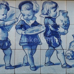 May include: Blue and white ceramic tile mural featuring three figures in antique clothing. The figures are carrying a flag, a plate, and a vase. The background includes additional vases and floral designs. The artwork is reminiscent of Delftware.