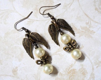 White Pearl Earrings with Brass Wings and Bows (3747)