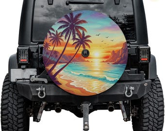 May include: A spare tire cover featuring a tropical beach scene with palm trees, ocean waves, and a sunset. The artwork is colorful, with shades of orange, blue, and purple. The cover is mounted on a black Jeep.