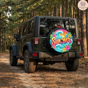 May include: A dark green Jeep with a spare tire cover featuring a colorful summer design. The cover displays the word "Summer" in a vibrant font, along with ocean waves, flowers, and a setting sun. The Jeep is parked on a dirt road in a forest.