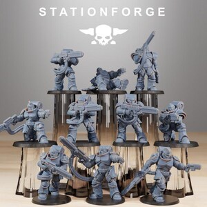 May include: A collection of gray miniature figurines of armored soldiers, each holding a weapon. The figurines are arranged on a tiered display. The text "STATIONFORGE" is at the top of the image.