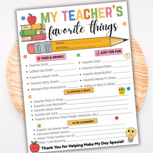 May include: A printable "My Teacher's Favorite Things" questionnaire. The colorful sheet features a pencil, books, and an apple illustration. It includes sections for favorite food, hobbies, and classroom needs. The text reads "Thank You for Helping Make My Day Special!"