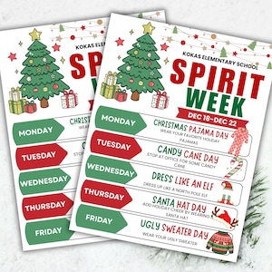 May include: Two printed flyers for Kokas Elementary School Spirit Week, December 18-22. The flyers feature a Christmas tree graphic, gift boxes, and a schedule with daily themes like Pajama Day, Candy Cane Day, and Ugly Sweater Day.