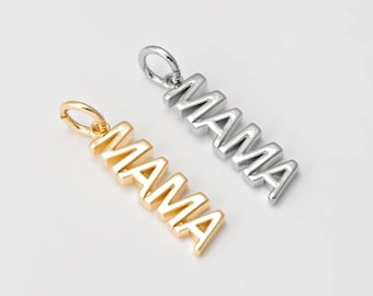 May include: Two silver charm pendants with the word "MAMA" spelled out in block letters. One pendant is gold and the other is silver.
