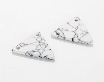 May include: Two triangular white stone pendants with black veining. Each pendant has two holes for stringing. The pendants are smooth and polished, ideal for jewelry making or crafting projects.
