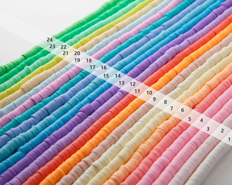May include: Rows of colorful, flat polymer clay beads in a variety of shades, including pink, orange, yellow, green, and blue. The beads are arranged diagonally, with numbers indicating the color sequence.