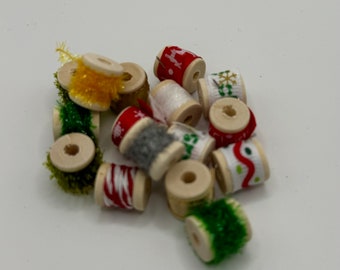 DOLLS HOUSE MINIATURES - Christmas trims on wooden reel  x1