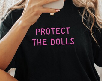 Camiseta "Protect The Dolls": Camiseta unisex feminista activista