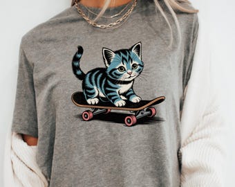 Camiseta vintage de los 90 con diseño de gato patinador: diseño retro de gatito patinador, ropa de calle de la vieja escuela, estética desgastada.