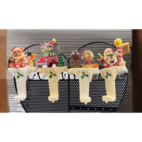 Four Plastic Resin Stocking Hangers Vintage New Designs Inc Christmas Vintage