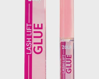 May include: A pink and white box and a clear tube of lash lift glue. The box and tube have the text "ZOLA LASH LIFT GLUE" in a bold, pink font. The tube has a pink cap and contains 5ml of glue.