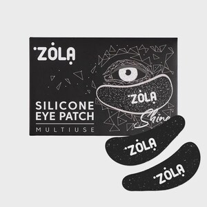 May include: Black silicone eye patches with the brand name "ZOLA" in white. The packaging features the text "SILICONE EYE PATCH" and "MULTIUSE". The design includes an eye illustration and the word "Shine".