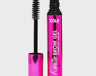 May include: A bright pink tube of Zola Keratin Brow Gel with a black applicator brush. The tube has black text that reads "Keratin Brow Gel" and "Strong Fix + nourish". The applicator brush is black with a spiral brush head.