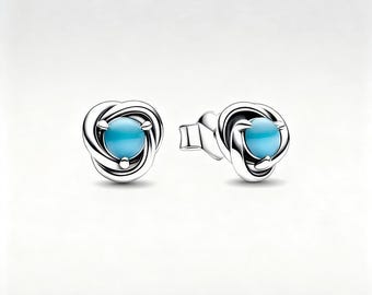 Pendientes de plata de ley con piedra de nacimiento de diciembre y diseño de círculo de eternidad.