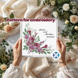 May include: An embroidery pattern featuring a floral arrangement of deep purple calla lilies and orchids with green foliage. The text reads Pattern for embroidery, Stella and Arthur, 10.07.2026, and X-Stitch Labb. The design is displayed on a white square card.