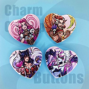 May include: Four heart-shaped buttons with illustrations of fantasy characters. The buttons feature pink, red, purple, and white colours. The text "Charm Buttons" is visible in the background.