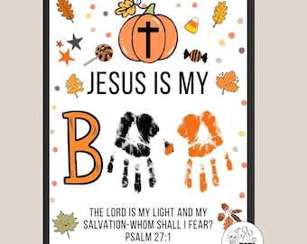 May include: A framed Halloween-themed print with the text "JESUS IS MY BOO." The artwork features a pumpkin with a cross, handprints, and fall-themed illustrations. The bottom text reads "THE LORD IS MY LIGHT AND MY SALVATION-WHOM SHALL I FEAR? PSALM 27:1."