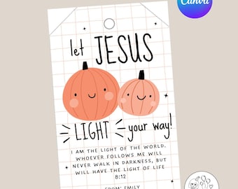 May include: A white tag with the text "let JESUS LIGHT your way!" and two smiling orange pumpkins. The tag also includes a Bible verse and the name "EMILY". The Canva logo is in the upper right corner.