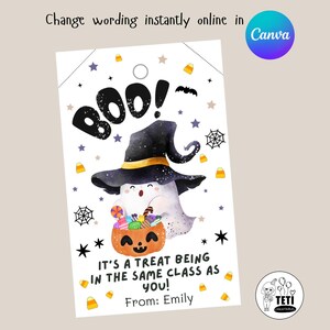 May include: A Halloween-themed gift tag featuring a ghost wearing a witch hat and holding a pumpkin basket filled with candy. The tag says "Boo!" and "It's a treat being in the same class as you!" with the name "Emily" at the bottom. The tag has a hole at the top.