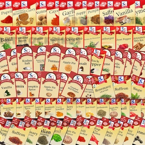 May include: A selection of spice packets with red, white, and gold labels. The packets are arranged in rows and columns, displaying various spices such as saffron, basil, and cinnamon. The brand name "Spice Girls" is visible.