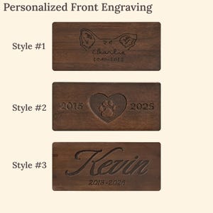 May include: Three rectangular dark brown wooden plaques labeled Style #1, Style #2, and Style #3. Style #1 features an engraved dog ear outline, the name Charlie, and dates 2010-2025. Style #2 shows a heart with a paw print and dates 2015-2025. Style #3 displays the name Kevin and dates 2018-2026.
