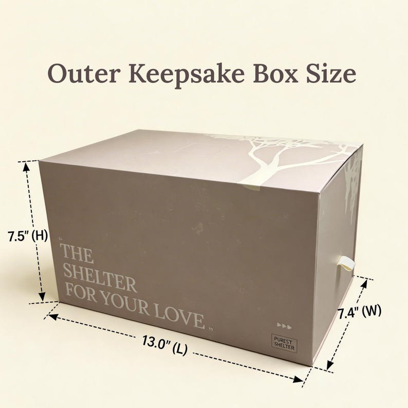 May include: A rectangular beige keepsake box with a white tree graphic and the text "THE SHELTER FOR YOUR LOVE" and "PUREST SHELTER". Dimensions are labeled as 13.0 inches long, 7.5 inches high, and 7.4 inches wide with a small pull tab.