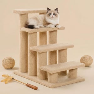 May include: A beige cat tree with multiple levels, a resting cat, and two yarn balls. The cat tree has a stepped design with a soft, carpet-like texture. A feather toy with a wooden handle is also visible.