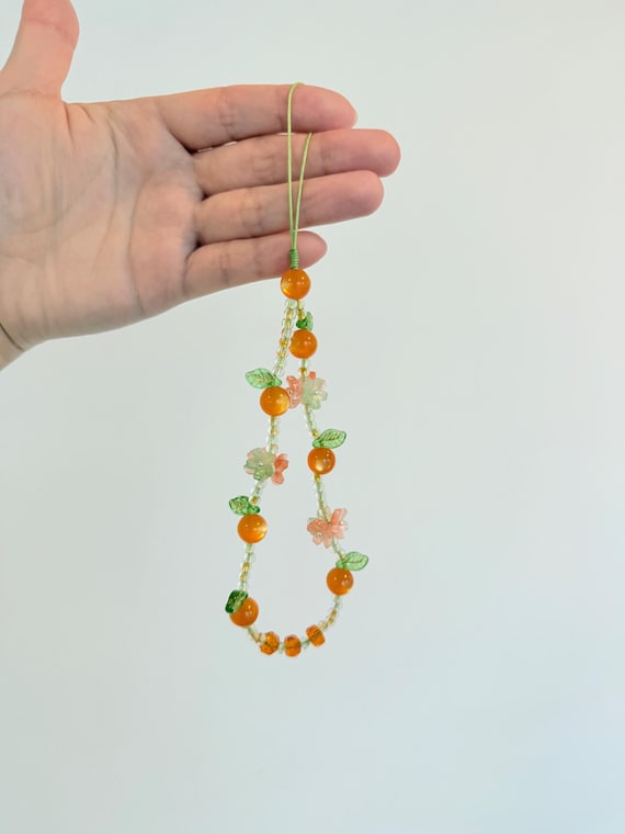 Orange Beaded Phone Charm: Floral Wrist Strap with Crystal Beads