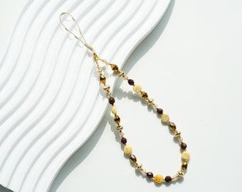 Elegant Shell & Brown Crystal Phone Charm: Gold Beaded Strap