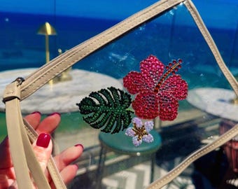 Genomskinlig, glittrig och blommig strandkutch – PVC-hibiskusväska, strand- eller semesteraccessoar (brun)