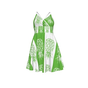May include: A sleeveless dress with a green and white pineapple pattern. The dress features a V-neckline and a flared skirt. The pineapple design is repeated throughout the dress, creating a summery and tropical vibe.