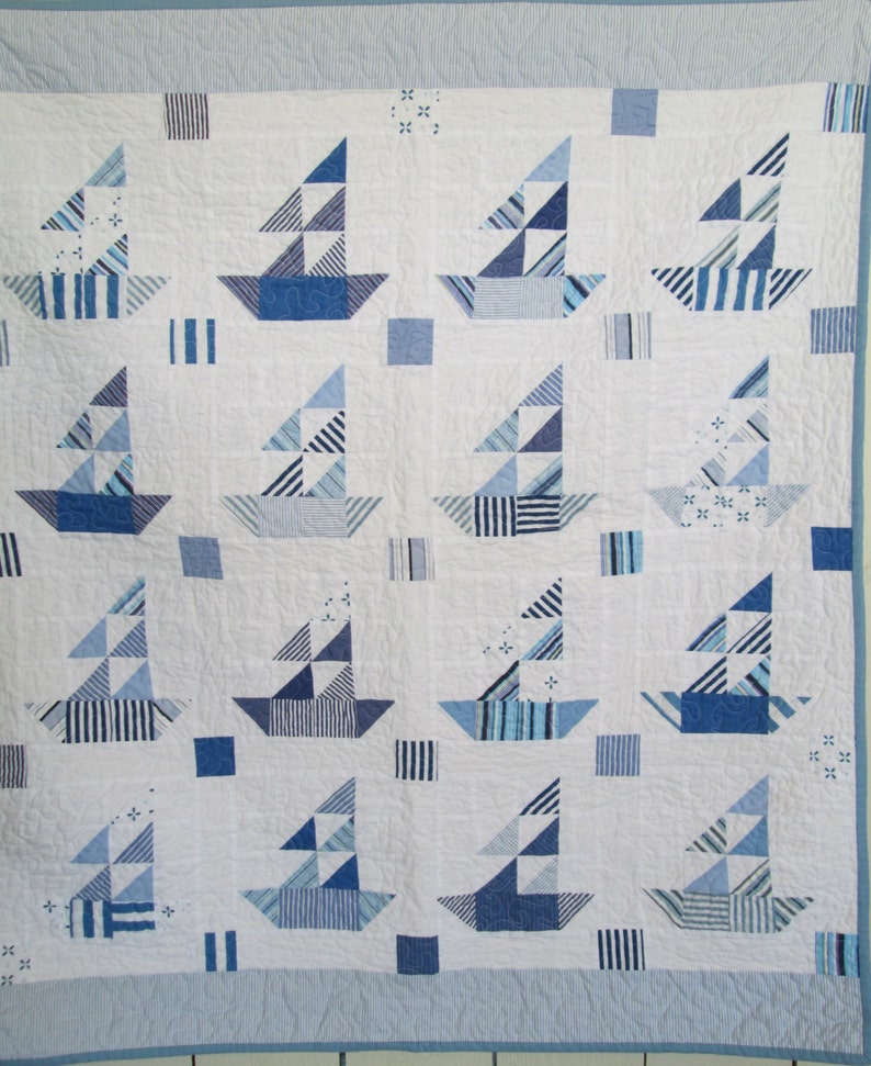 The Regatta Baby Sailboat Quilt in Shades of Blue and White by Etsy