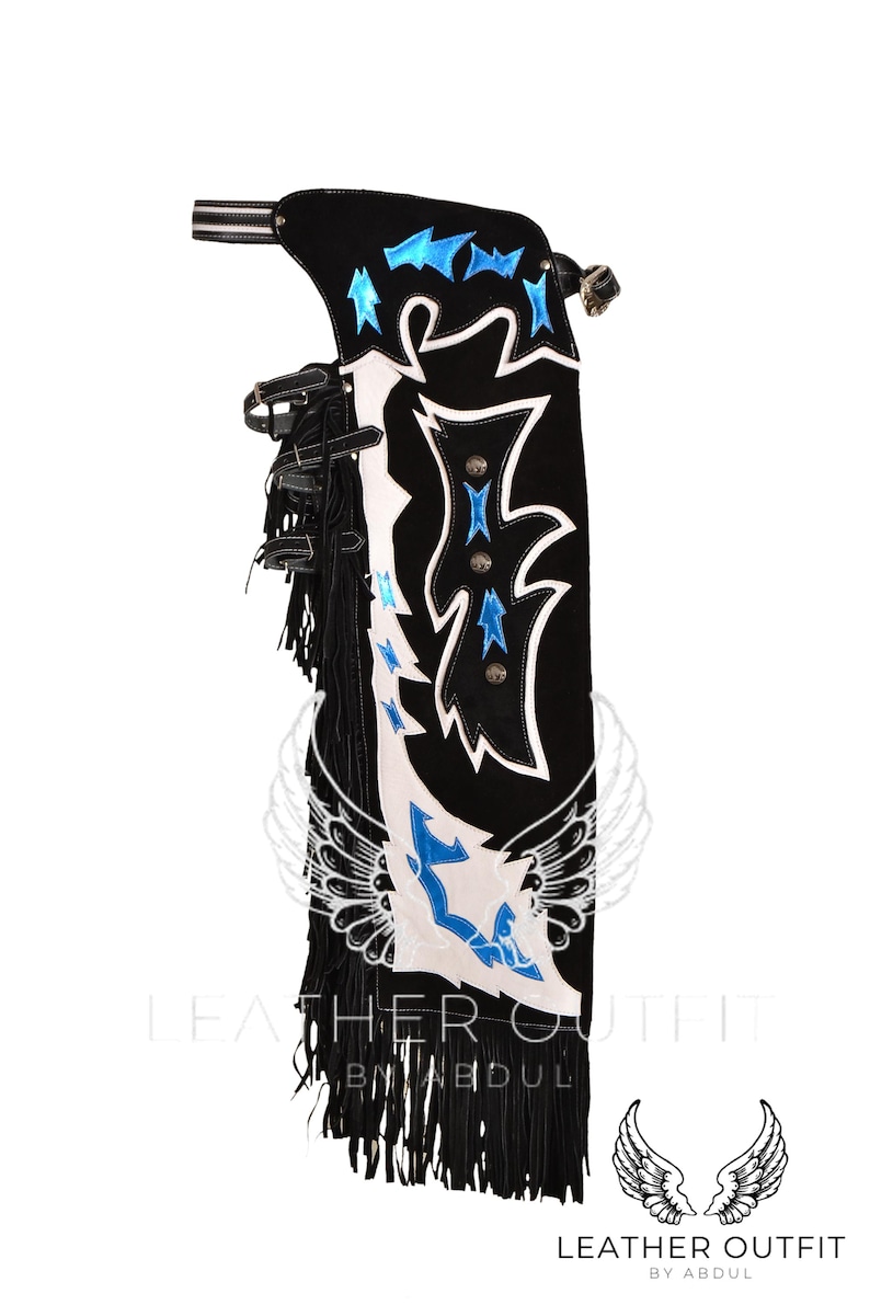 May include: Black leather chaps with white and blue embroidery. The chaps feature a fringe detail and a wing design. The text "Leather Outfit by Abdul" is visible at the bottom of the image.