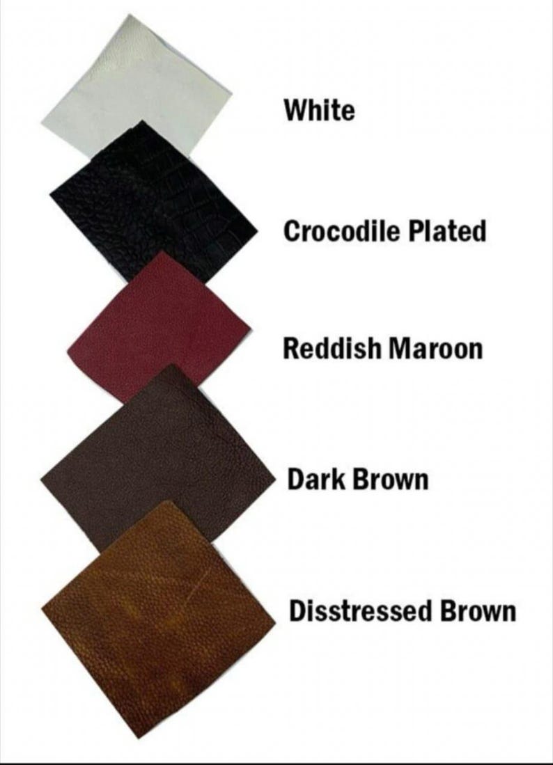 May include: A collection of leather swatches in various colors, including white, black crocodile-plated, reddish maroon, dark brown, and distressed brown. Each swatch is a square shape, with the color names displayed next to each swatch.