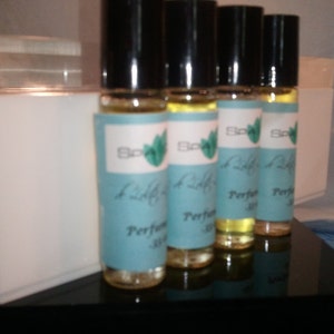 4 Perfume Roll-on 1/3 oz BEST SELLERS 100% pure fragrance oils over 100 fragrances to choose from image 4