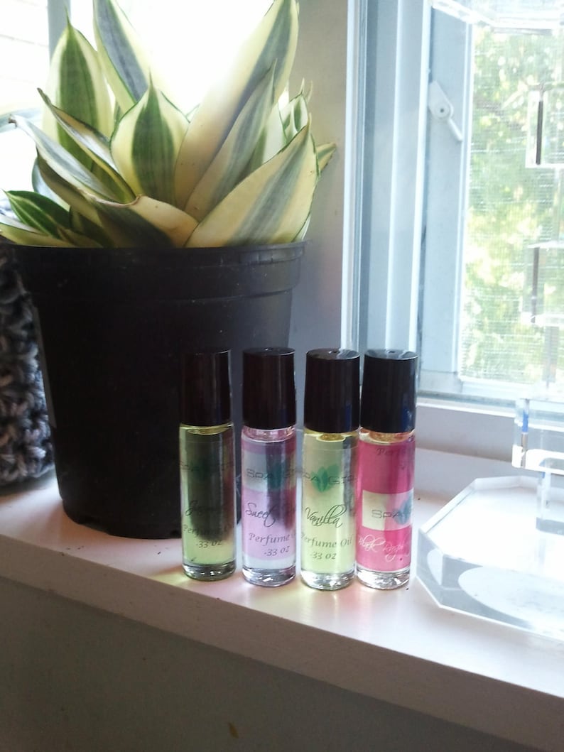 4 Perfume Roll-on 1/3 oz BEST SELLERS 100% pure fragrance oils over 100 fragrances to choose from image 1