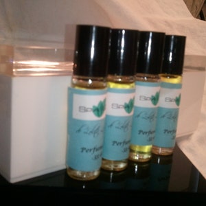 4 Perfume Roll-on 1/3 oz BEST SELLERS 100% pure fragrance oils over 100 fragrances to choose from image 5