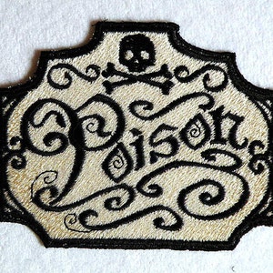 May include: Black and white embroidered patch with a skull and crossbones and the word "Poison" in a decorative font.