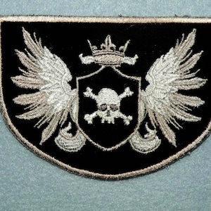 Skull and Crossbones Crest Iron on  4.5" x 3.23"