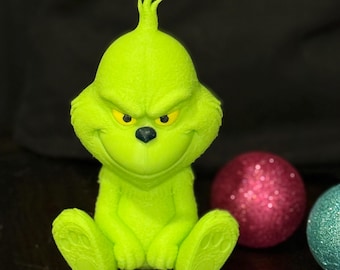 Seated Grinch on a Shelf Figurine