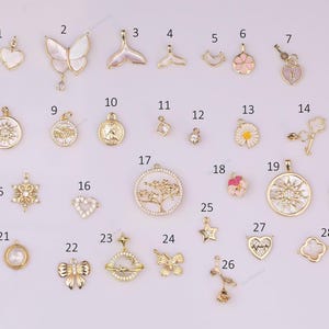 Nuovi stili di charm in oro 18 carati GF, selezione di fiori, chiavi, cuori, alberi, delfini, sole, pavé di zirconi, bracciale e collana in oro 18 carati GF! Oro 1420 14/20 riempito