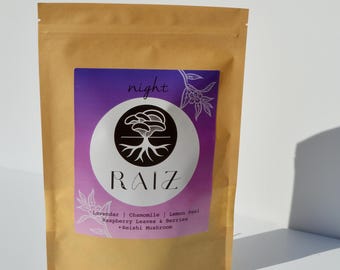 May include: A brown paper bag with a purple and white label that says "night" and "RAIZ" with a drawing of a tree. The label also lists the ingredients: Lavendar, Chamomile, Lemon Peel, Raspberry Leaves & Berries, +Reishi Mushroom.